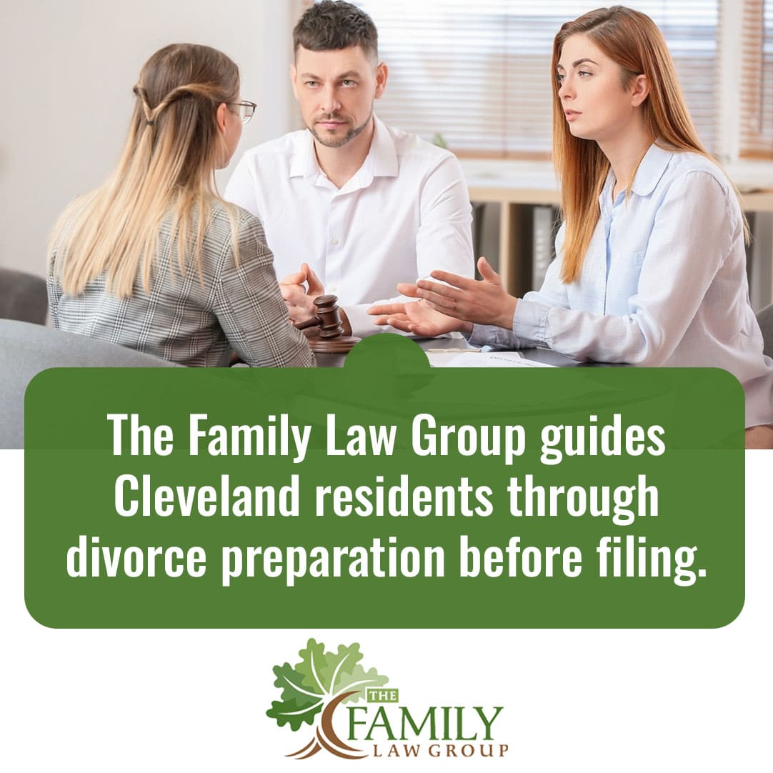 Couple meeting with family law attorney in Cleveland to discuss divorce preparation and legal process