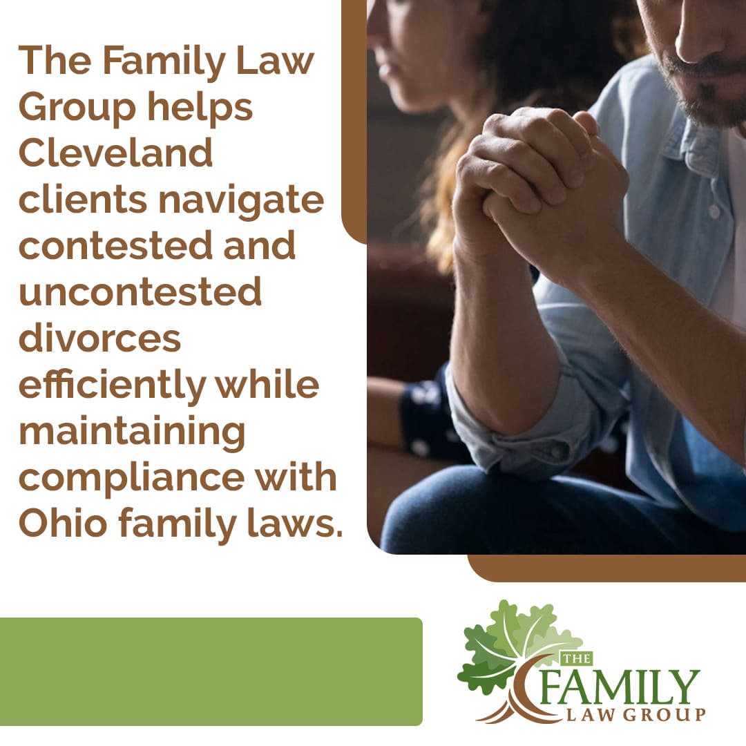 Couple sitting apart looking distressed during divorce consultation with Cleveland family law attorney