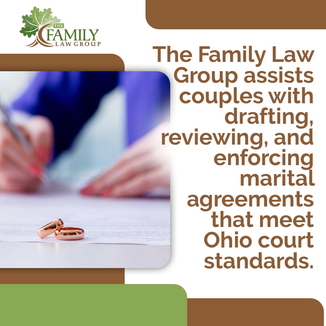 Wedding rings on legal document representing marital agreement drafting and review by Ohio family law attorney