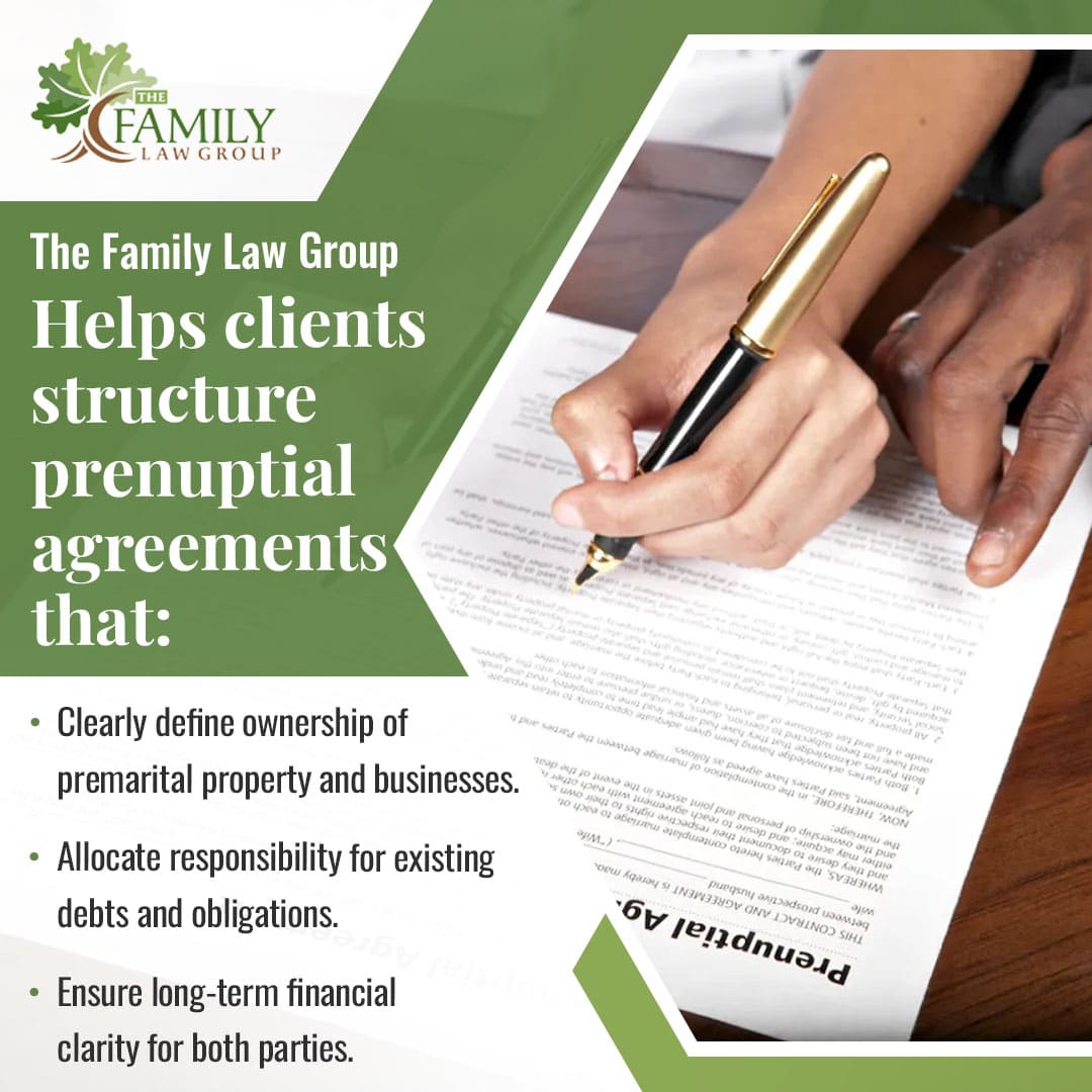 Couple signing prenuptial agreement document outlining asset protection, debts, and financial responsibilities before marriage